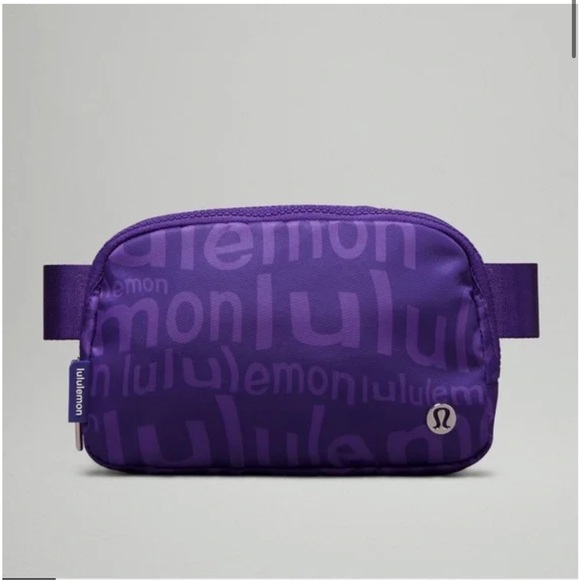 lululemon athletica Handbags - Lululemon Everywhere Belt Bag 1L Wobbley Wordmark Atomic Purple Petrol NWT